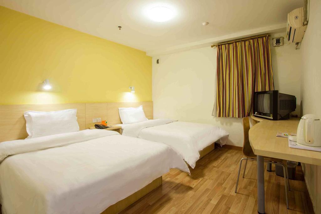 7Days Inn Guangzhou Gangding Longkou XI Road Γκουανγκζού Δωμάτιο φωτογραφία